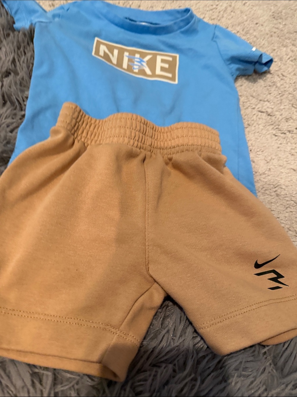 Nike Kids Tan Athletic Shorts with Black Swoosh